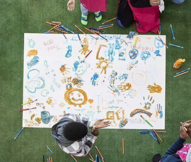 Kids Decorating an empty canvas 3