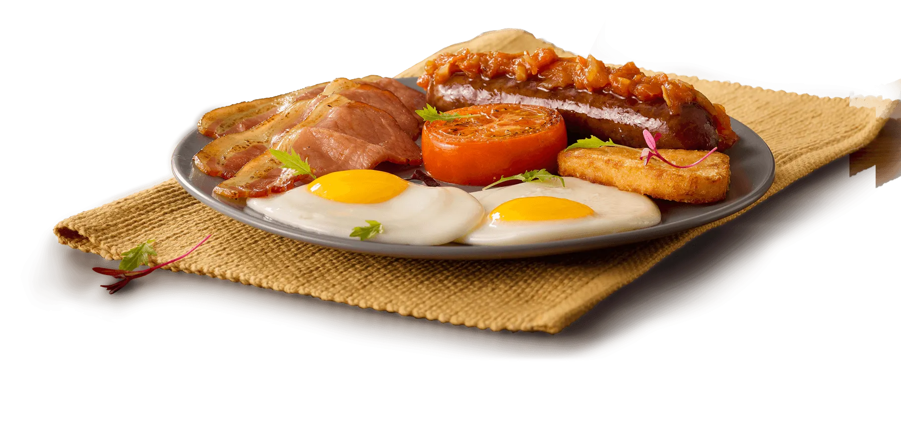 On the go breakfast with bacon and eggs and fried tomato On the go breakfast with bacon and eggs and fried tomato