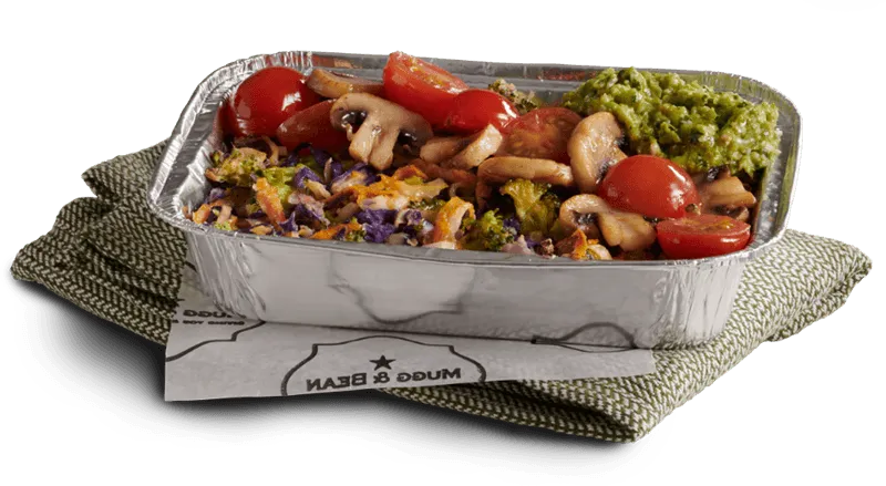 Roasted mushrooms and tomato in takeaway container Roasted mushrooms and tomato in takeaway container