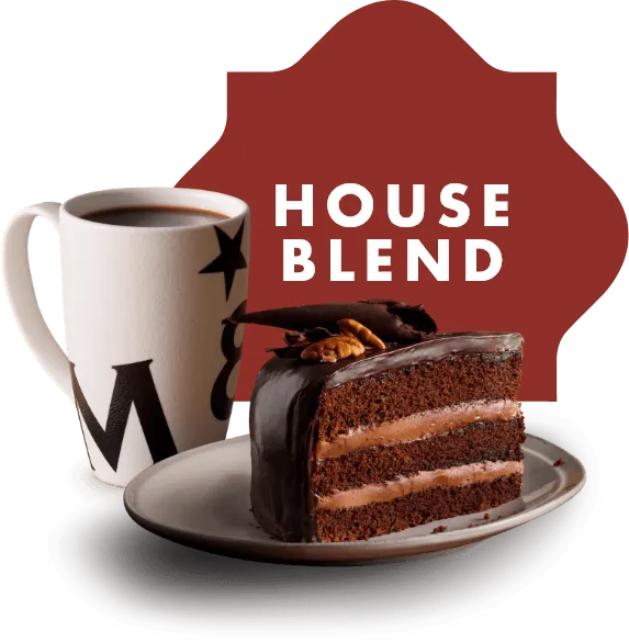 M&B house blend coffee with a slice of chocolate cake