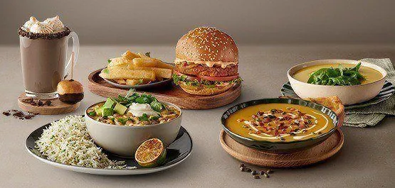 A mouth-watering burger with golden fries, soups and hot chocolate