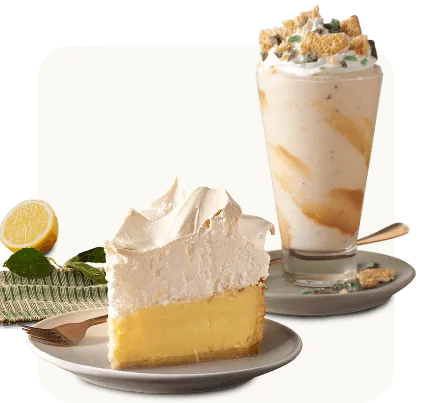 A slice of Lemon Meringue alongside a Peppermint Crisp® Summer Shake on serving plates
