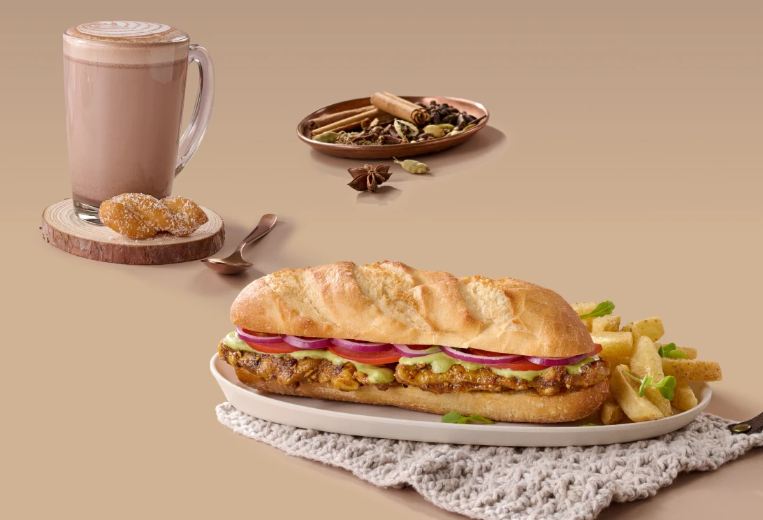 Spice up your winter with our new Butter Chicken Baguette and Masala Chai Latte with koesister