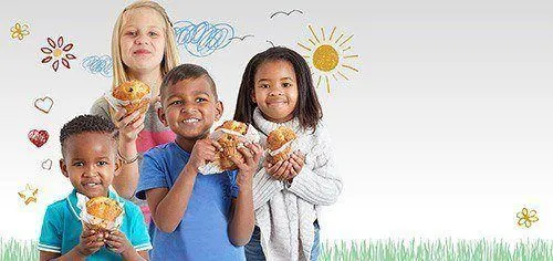 Kids eating muffins