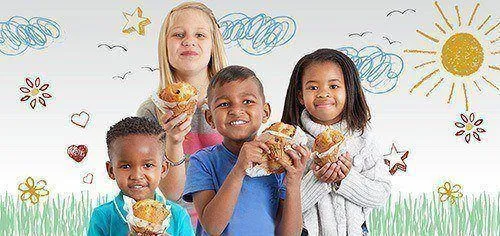 Kids eating muffins