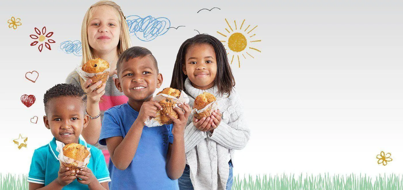 Kids eating muffins Kids eating muffins