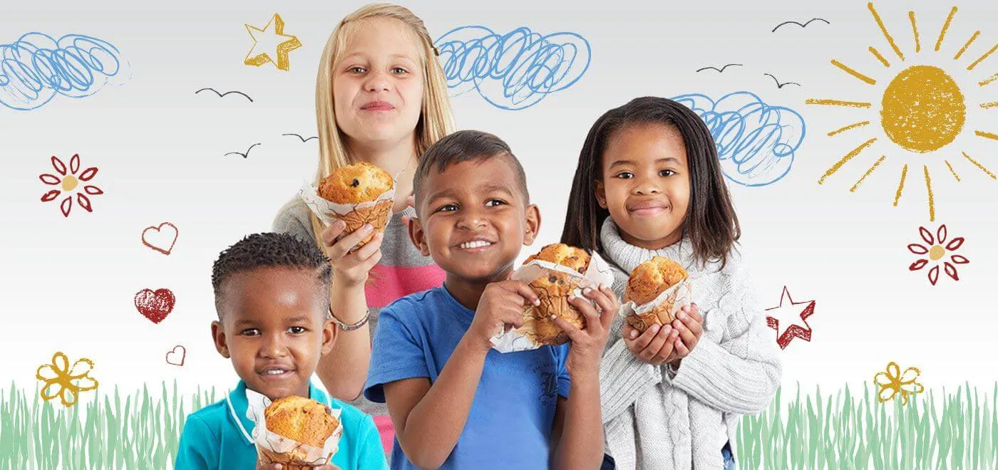 Kids eating muffins Kids eating muffins