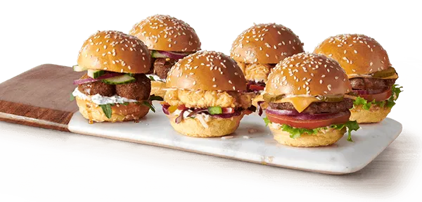 Mini burger sliders on a wooden board