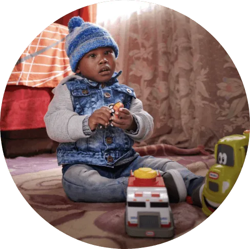 Lindo with truck toys