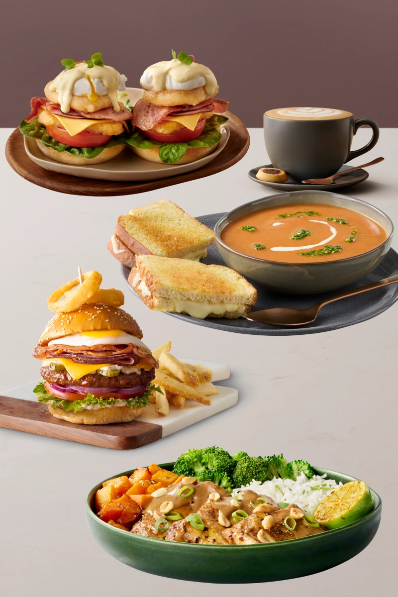 Eggs benedict, a deli sandwich, a stacked burger, an Asian rice bowl, and a cup of latte with latte art.