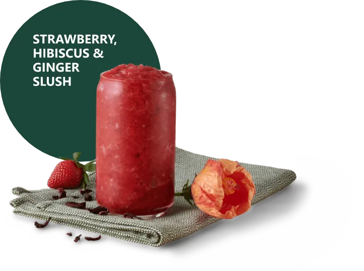 Strawberry hibiscus slush in a tall glass 